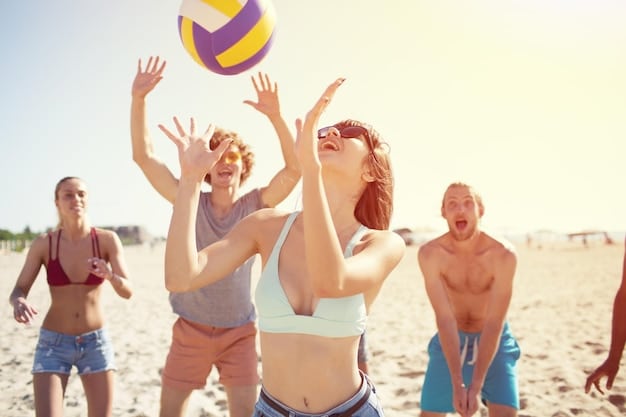 A group of friends playing beach volleyball on a sunny day. They are laughing and enjoying themselves, illustrating fun and free beach activities.