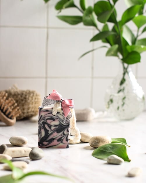 A close-up of a luxury resort bathroom featuring organic toiletries in eco-friendly packaging, showcasing a commitment to sustainable amenities and guest comfort.