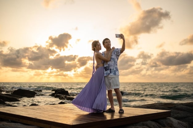 A couple taking a selfie during sunset on a luxury beach resort, capturing the vibrant colors of the sky, the ocean view, and the joyful expressions of the couple.