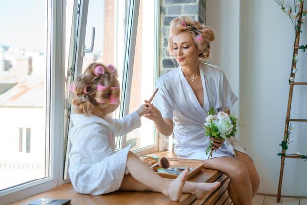 A bride sitting by a large window overlooking a luxury beach, getting her hair styled, with soft morning light illuminating the room and a professional stylist working.