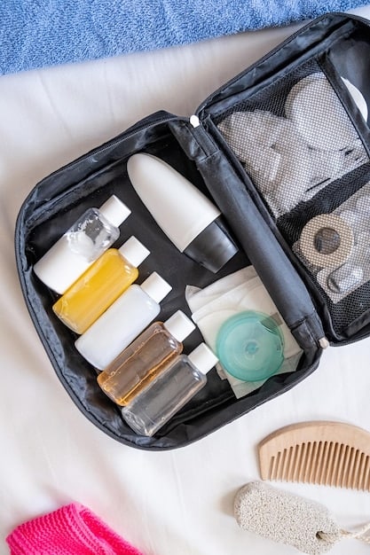 A neatly organized suitcase showing only essential, rolled clothing items, a small toiletries bag, and a compact tech pouch, illustrating efficient packing for a beach trip.