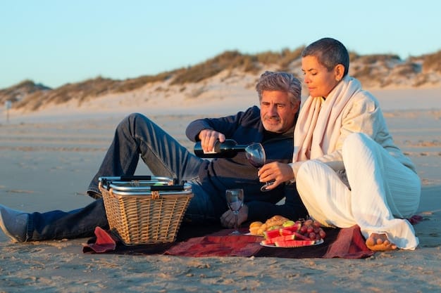 A couple enjoying a serene picnic on a beach at sunset, with a simple spread of food and drinks, the ocean in the background, demonstrating budget-friendly enjoyment.