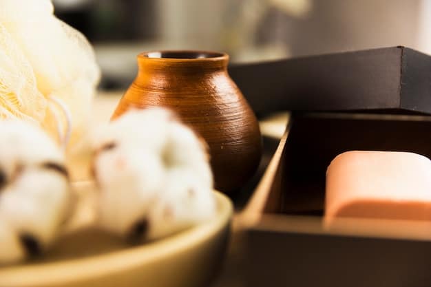 A close-up of a luxurious spa treatment room, showcasing modern decor, dim lighting, and a massage bed with fresh towels and essential oils.